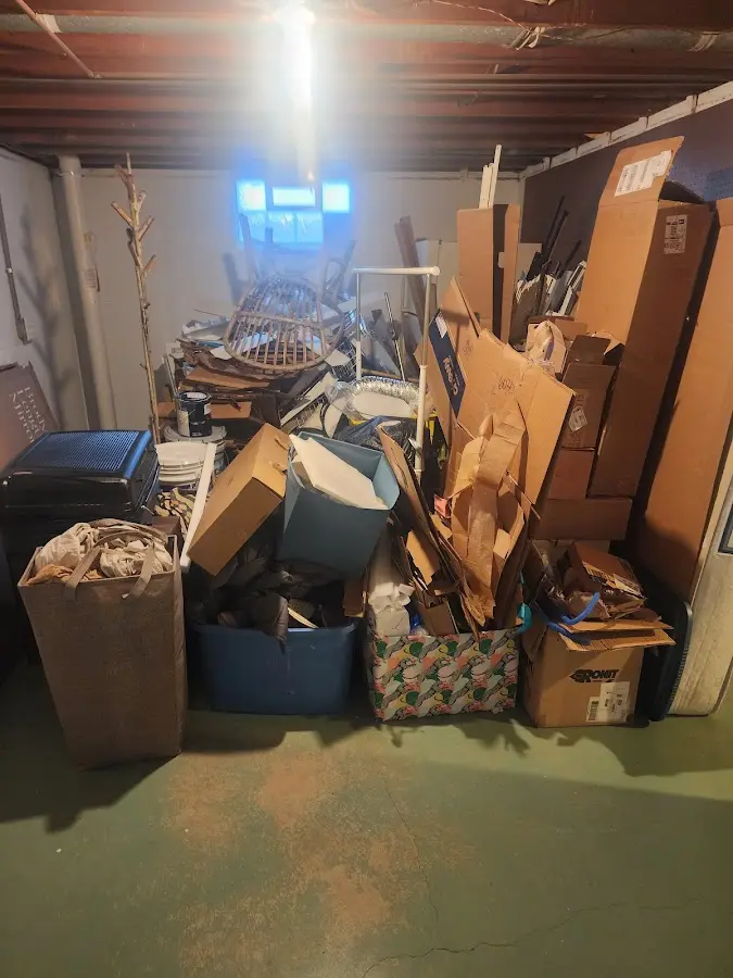 Roll-off dumpster container at job site for Construction Dumpster Rental in Garrison